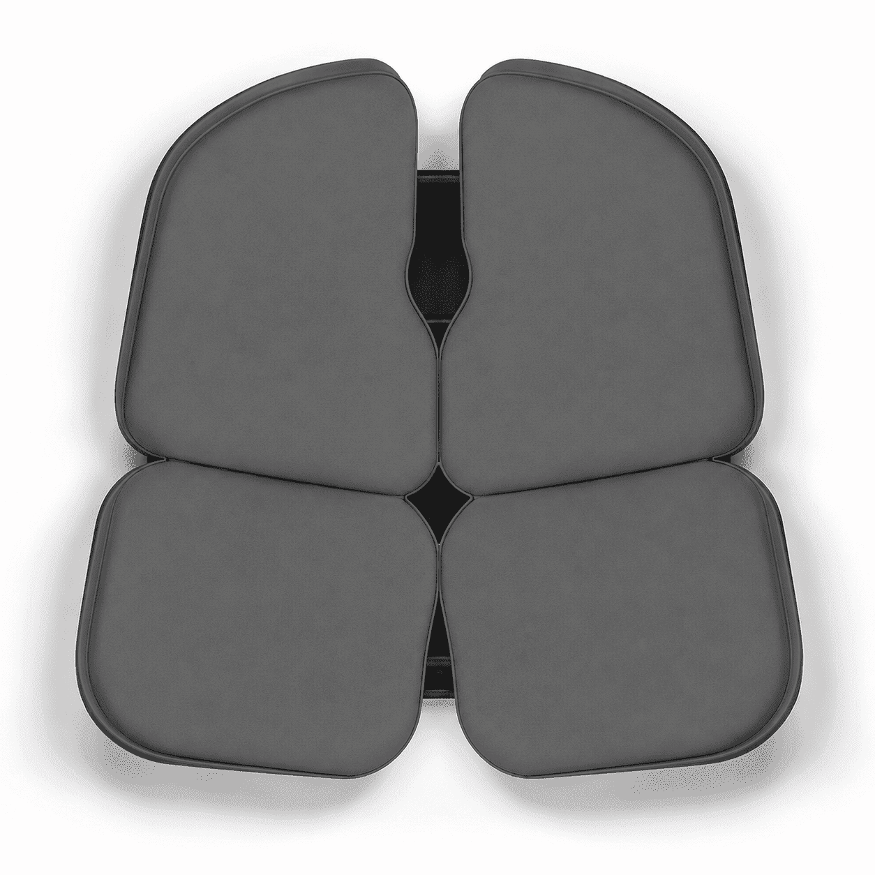 Coussin APORIA® Coccyx vu de dessus avec sa housse noire : décharge arrière entre quatre appuis indépendants