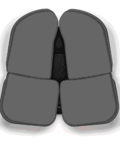 Coussin APORIA® Périnée vu de dessus avec sa housse noire : décharge centrale entre quatre appuis indépendants
